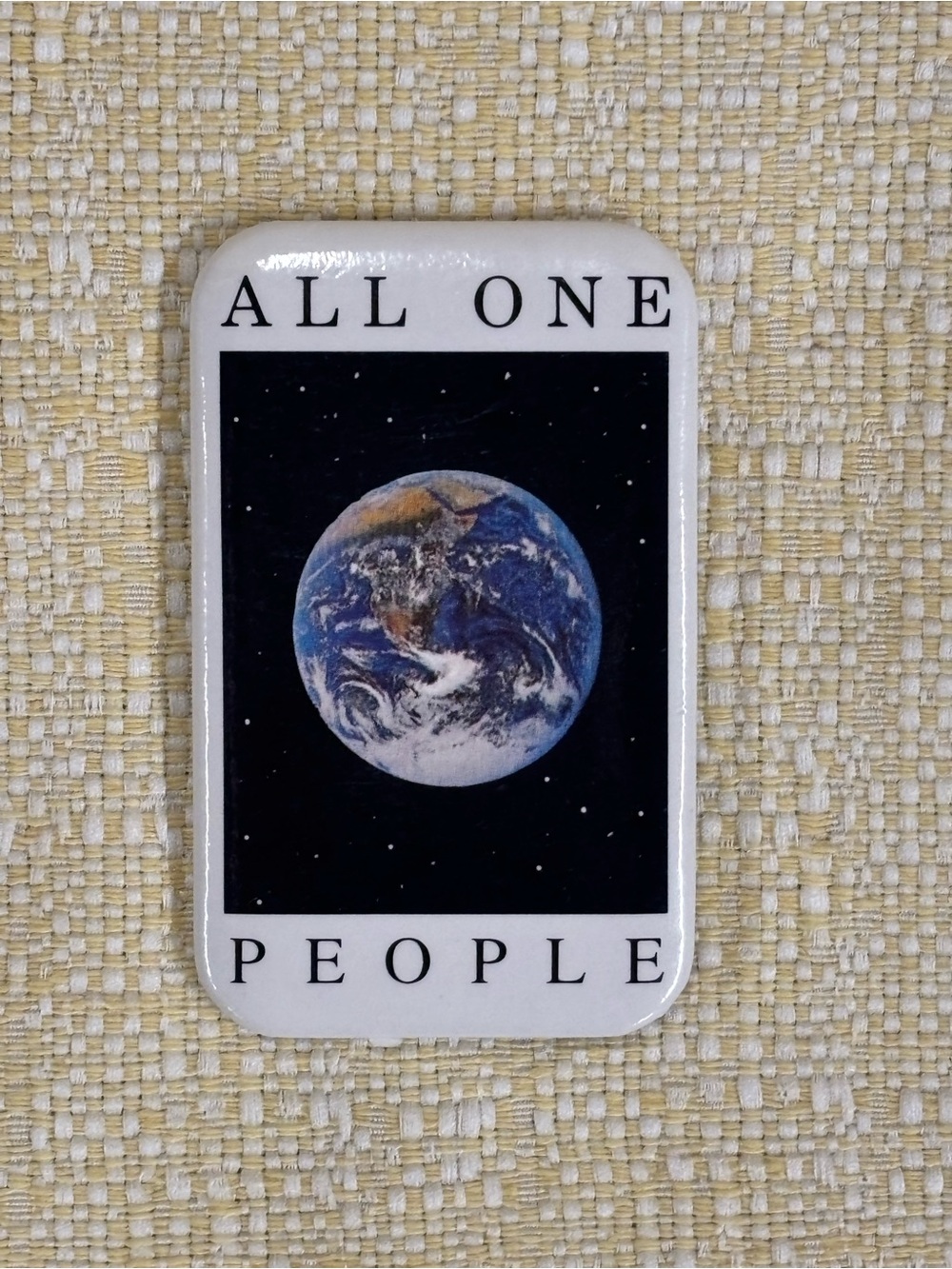 1987 White Earth Graphic pin. All One People'